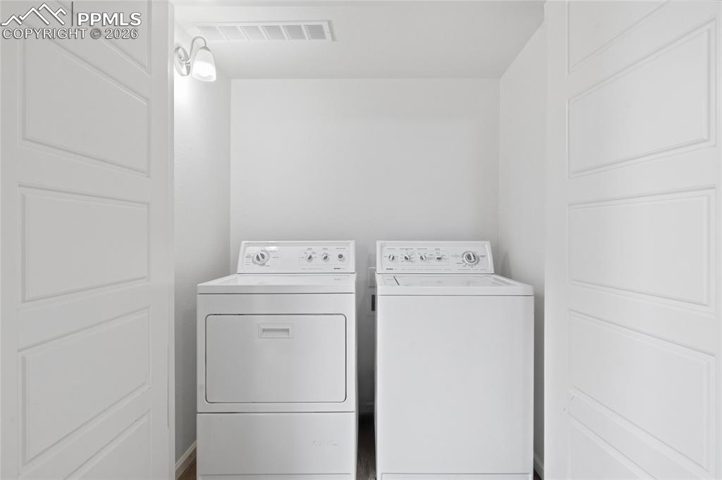 9414 Timberlake Loop Colorado Springs, CO 80927 - Photo 28 of 40 Laundry closet with independent washer and dryer