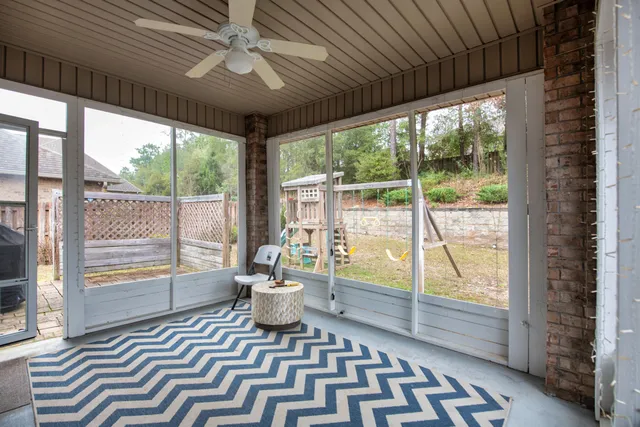 a spacious bedroom with a bed and a window