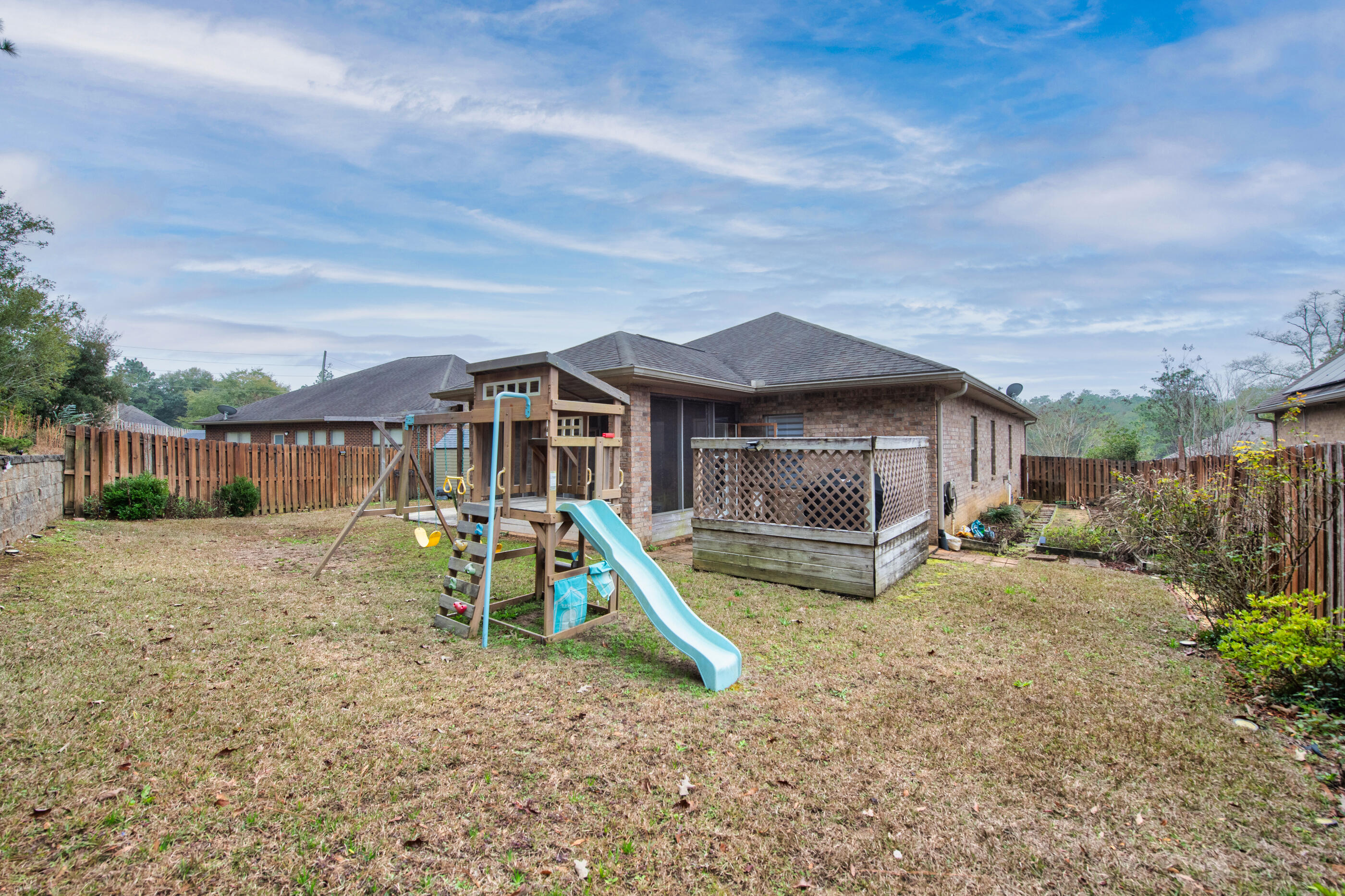 653 Red Fern Road Crestview, FL 32536 - Photo 33 of 34 a house with swimming pool in front of it