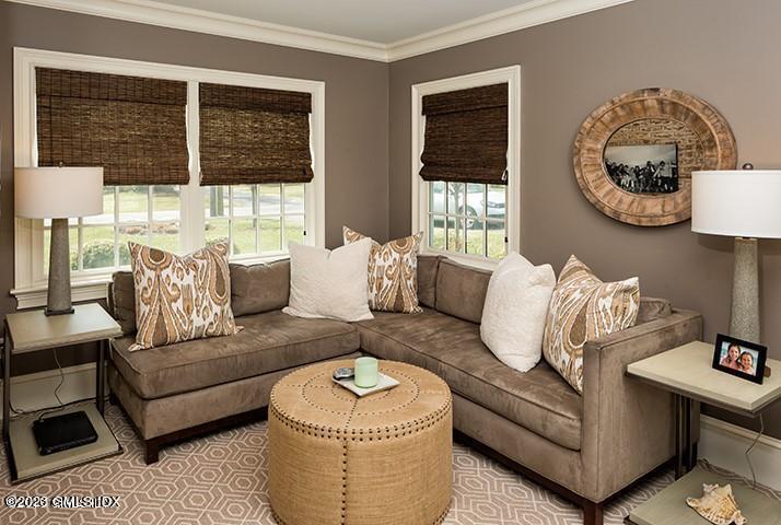 10 Field Road Riverside, CT 06878 - Photo 11 of 18 a living room with furniture and a large window