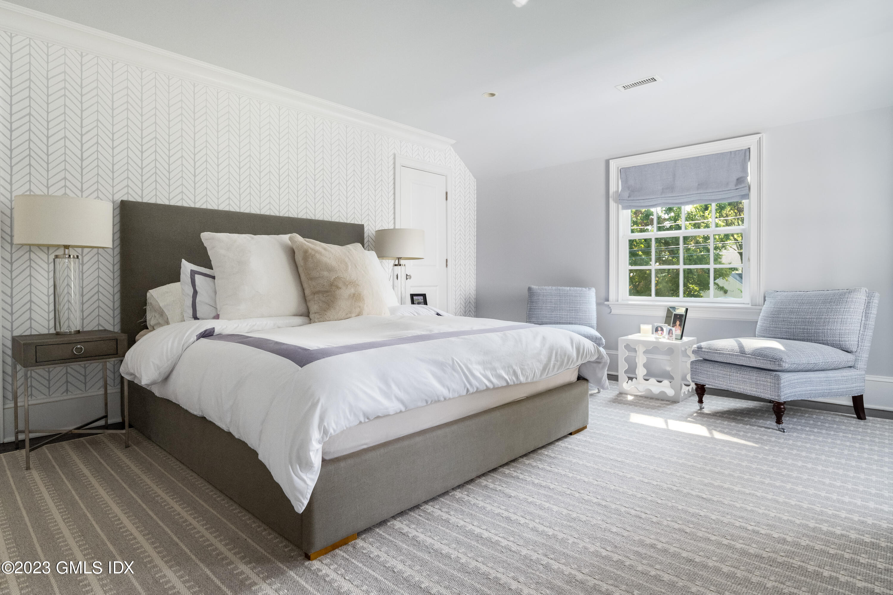 10 Field Road Riverside, CT 06878 - Photo 12 of 18 a bedroom with bed and a couch