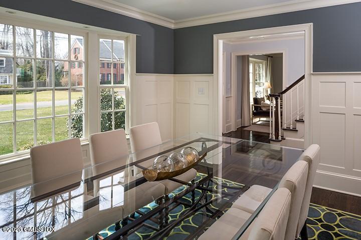 10 Field Road Riverside, CT 06878 - Photo 6 of 18 a living room with furniture and a large window