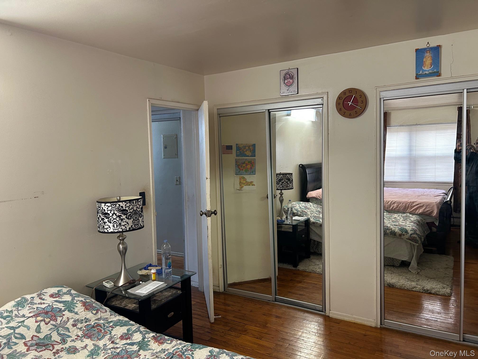 17 Sneden Place West, Unit 17 Spring Valley, NY 10977 - Photo 12 of 29 Bedroom with two closets and hardwood / wood-style floors