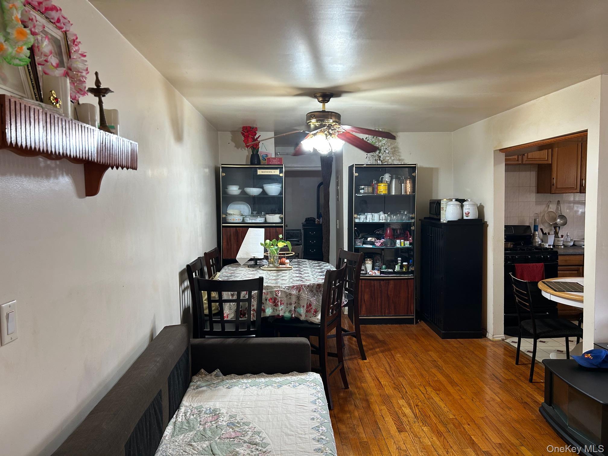 17 Sneden Place West, Unit 17 Spring Valley, NY 10977 - Photo 26 of 29 Dining room featuring hardwood / wood-style flooring and a ceiling fan