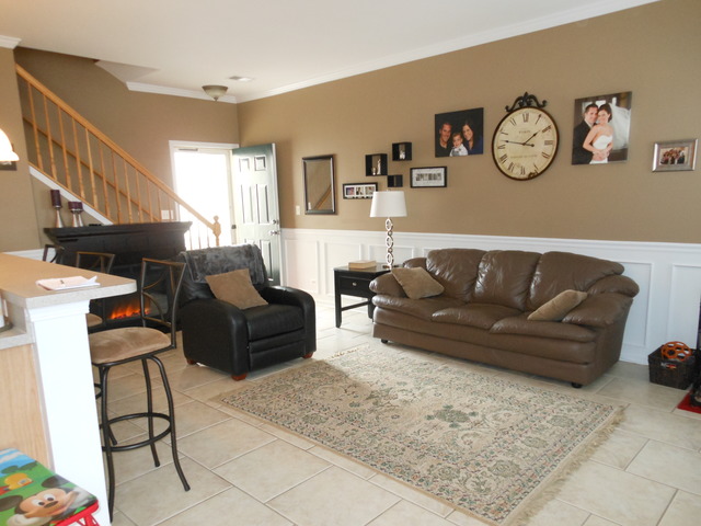 549 Springbrook Trail North Oswego, IL 60543 - Photo 2 of 19 a living room with furniture and a large window