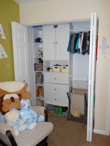 549 Springbrook Trail North Oswego, IL 60543 - Photo 16 of 19 a view of walk in closet with clothes and shoes
