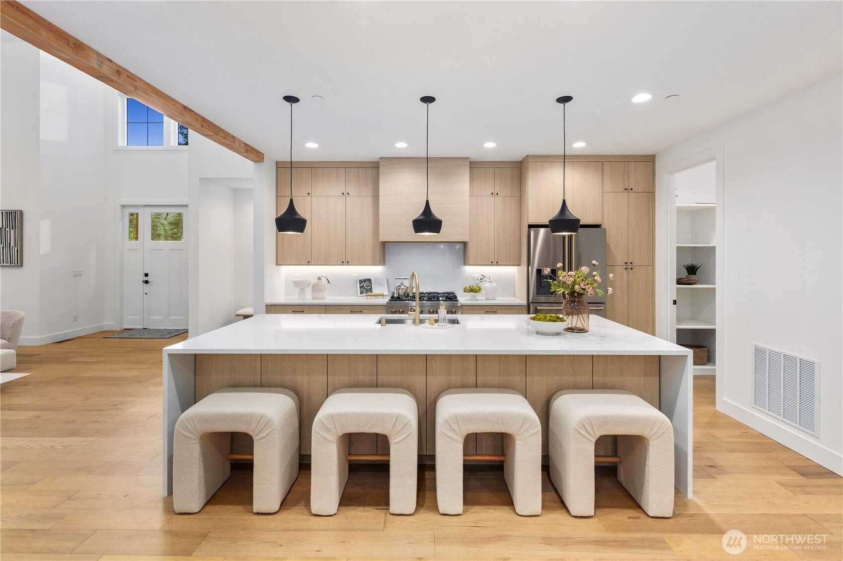 961 Larkspur Loop Cle Elum, WA 98922 - Photo 18 of 40 a large white kitchen with lots of white cabinets and stainless steel appliances