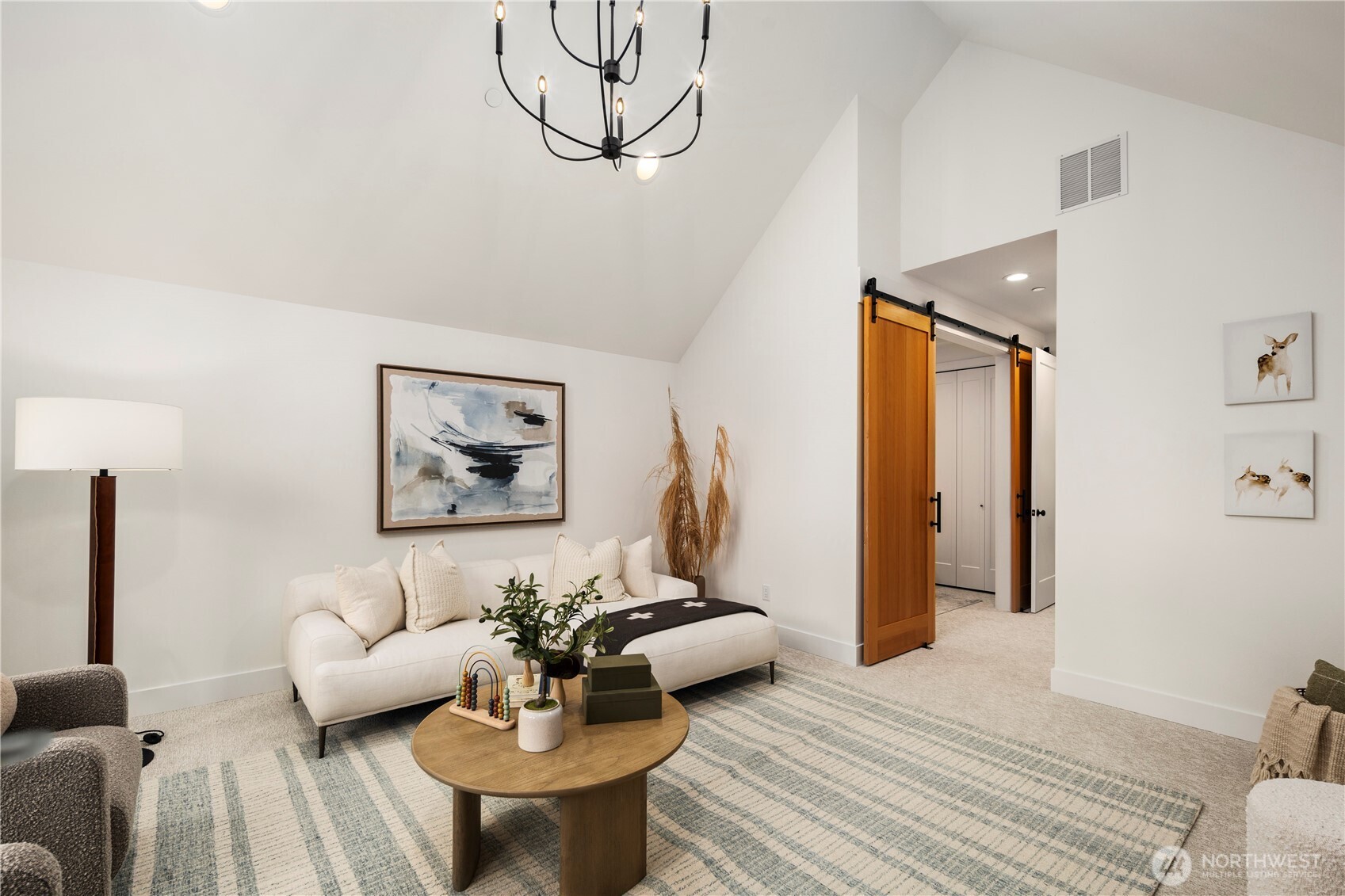 961 Larkspur Loop Cle Elum, WA 98922 - Photo 29 of 40 a living room with furniture and a wooden floor