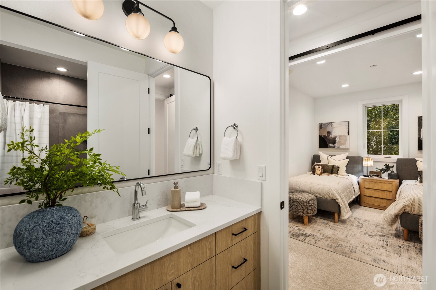 961 Larkspur Loop Cle Elum, WA 98922 - Photo 31 of 40 a spacious bathroom with a double vanity sink and a mirror