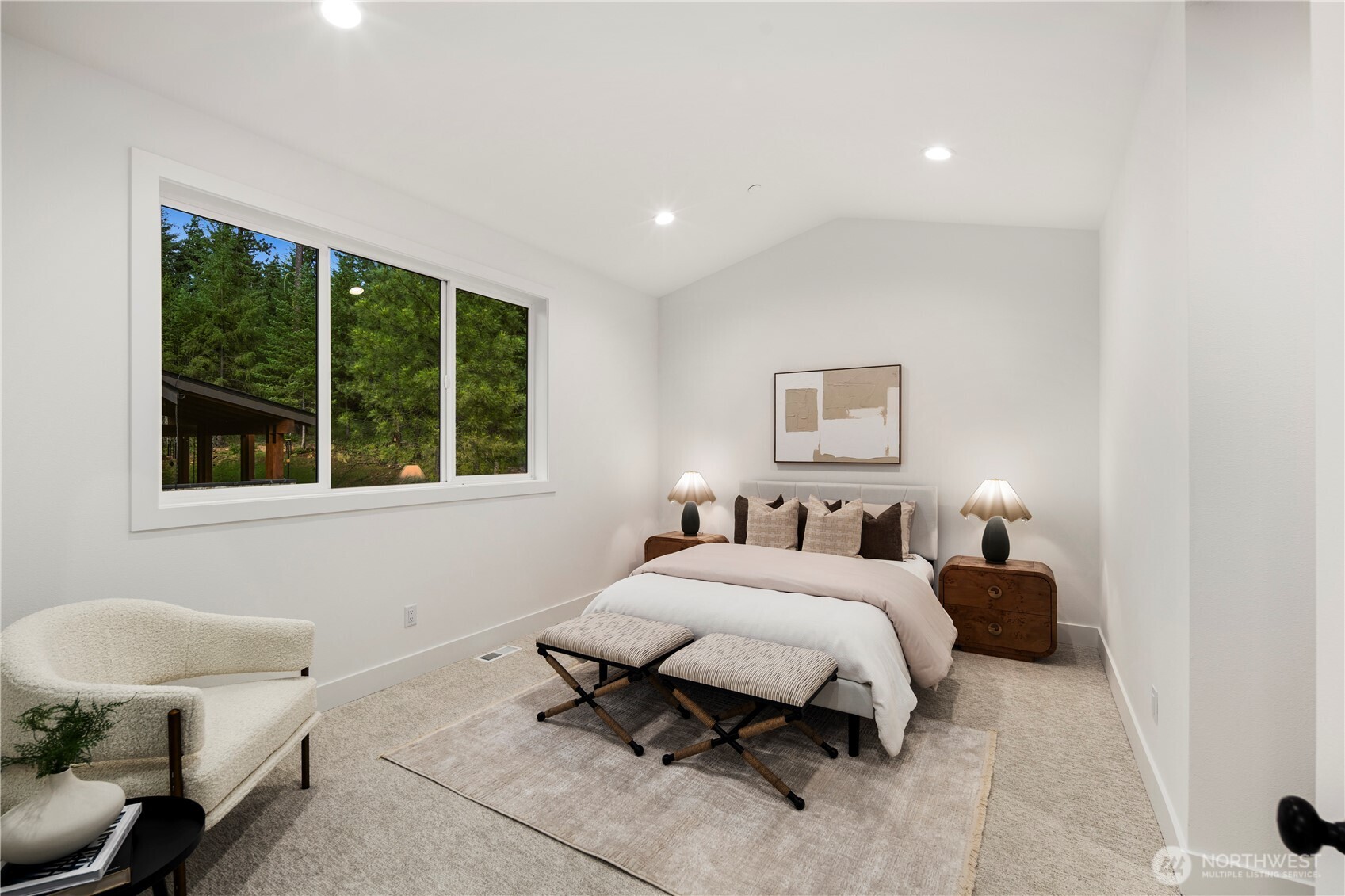 961 Larkspur Loop Cle Elum, WA 98922 - Photo 32 of 40 a bedroom with a bed and wooden floor