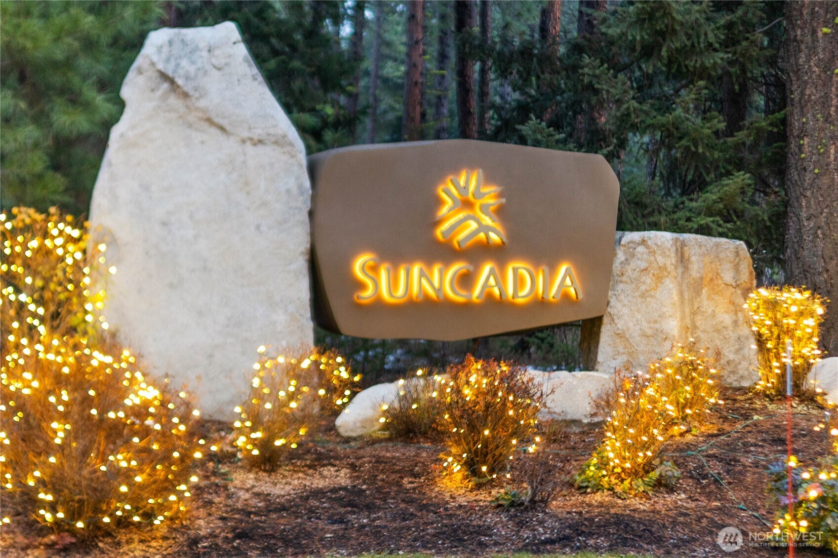 961 Larkspur Loop Cle Elum, WA 98922 - Photo 40 of 40 a view of a sign of golf club on a wall under a tree