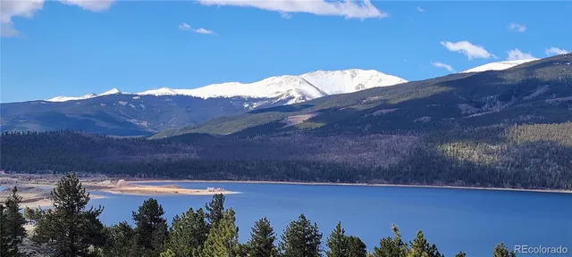 a view of a fireplace in middle of the green field