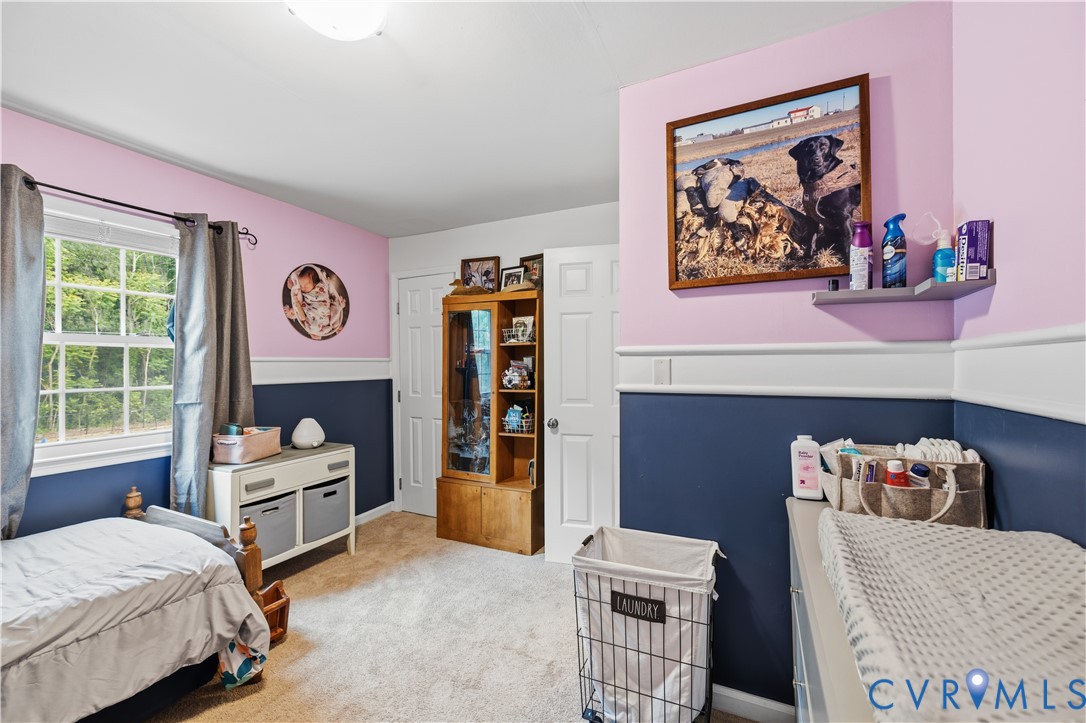 20108 Eugene Drive Sutherland, VA 23885 - Photo 20 of 41 a bedroom with furniture and a window