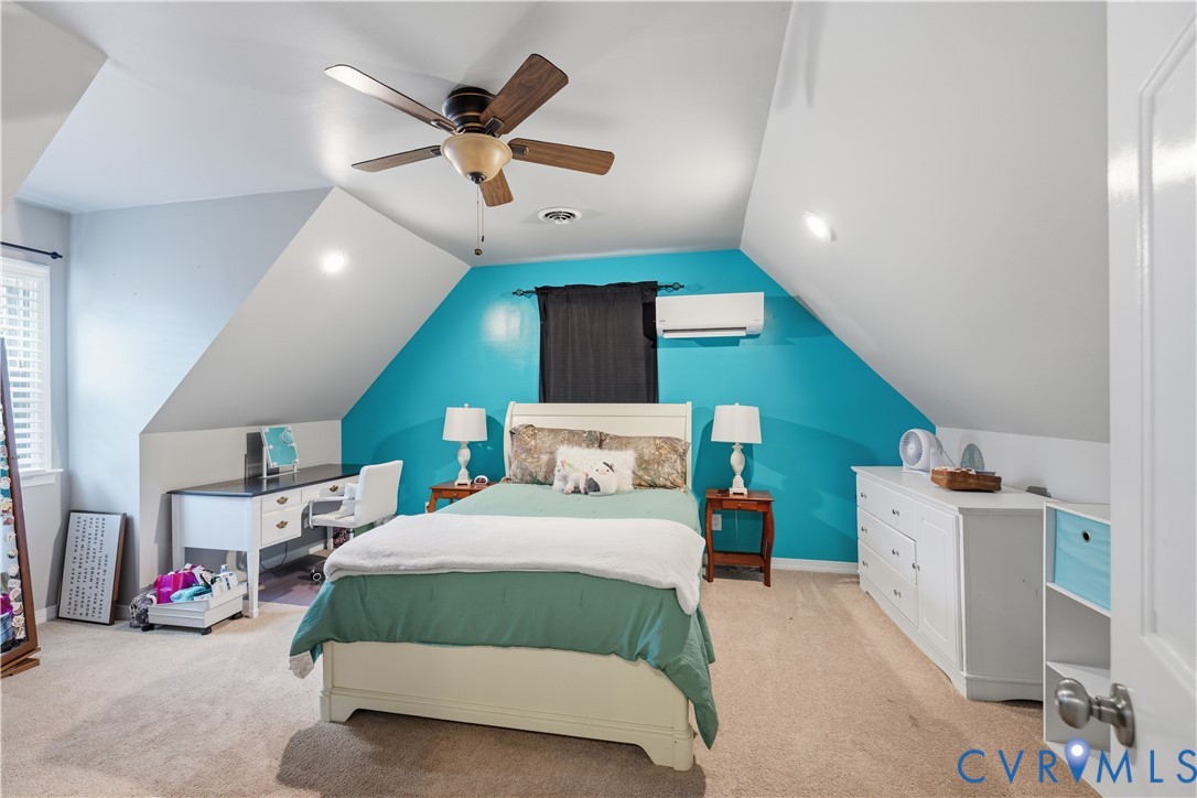 20108 Eugene Drive Sutherland, VA 23885 - Photo 22 of 41 a bedroom with a bed and a ceiling fan