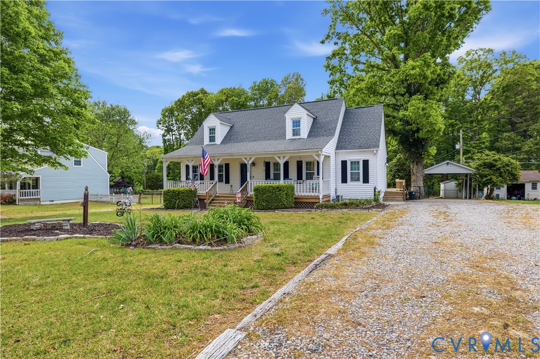 20108 Eugene Drive Sutherland, VA 23885 - Photo 3 of 41 a front view of a house with a yard