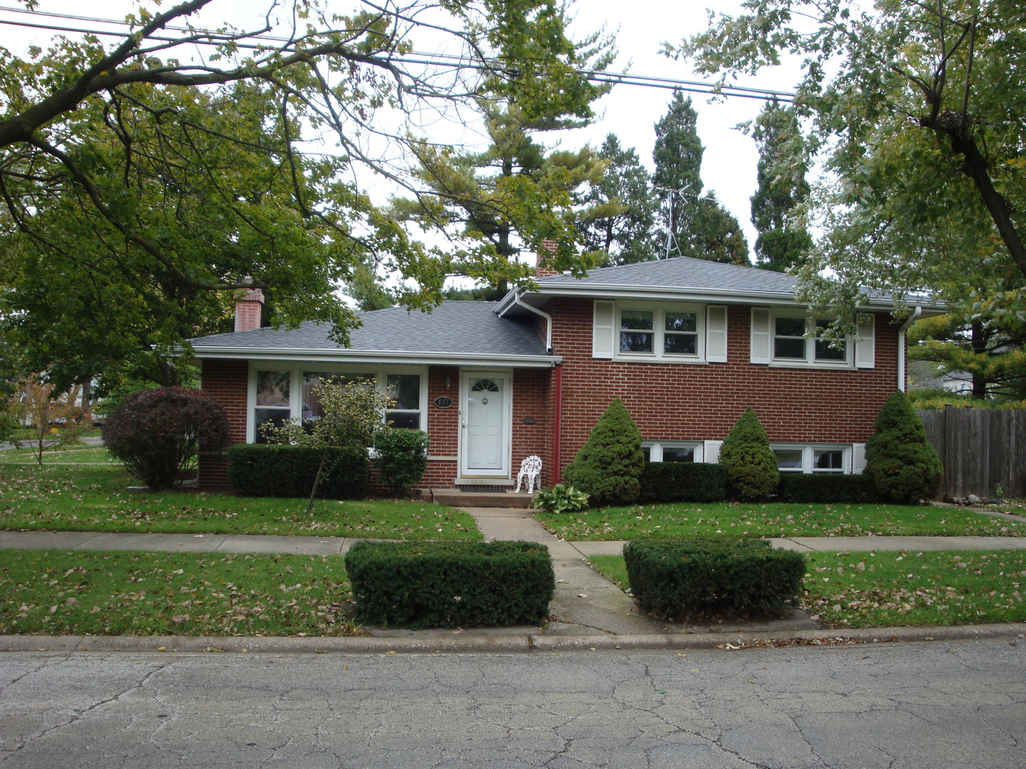 601 Forest Road La Grange Park, IL 60526 - Photo 1 of 22 a front view of a house with a yard