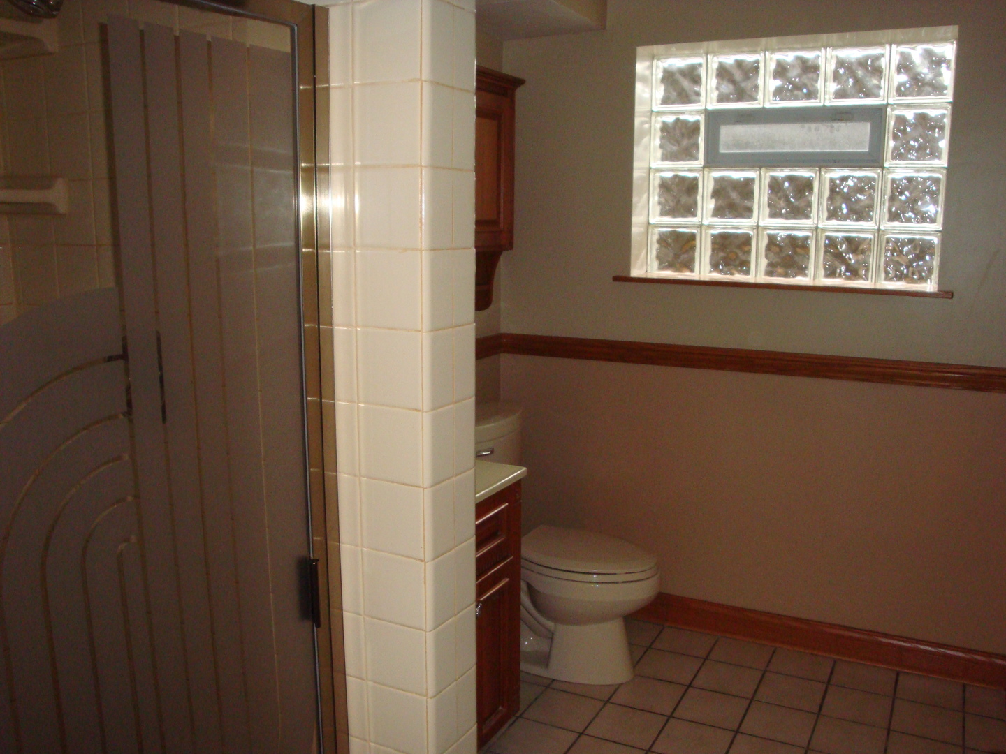 601 Forest Road La Grange Park, IL 60526 - Photo 18 of 22 a bathroom with a toilet and a shower