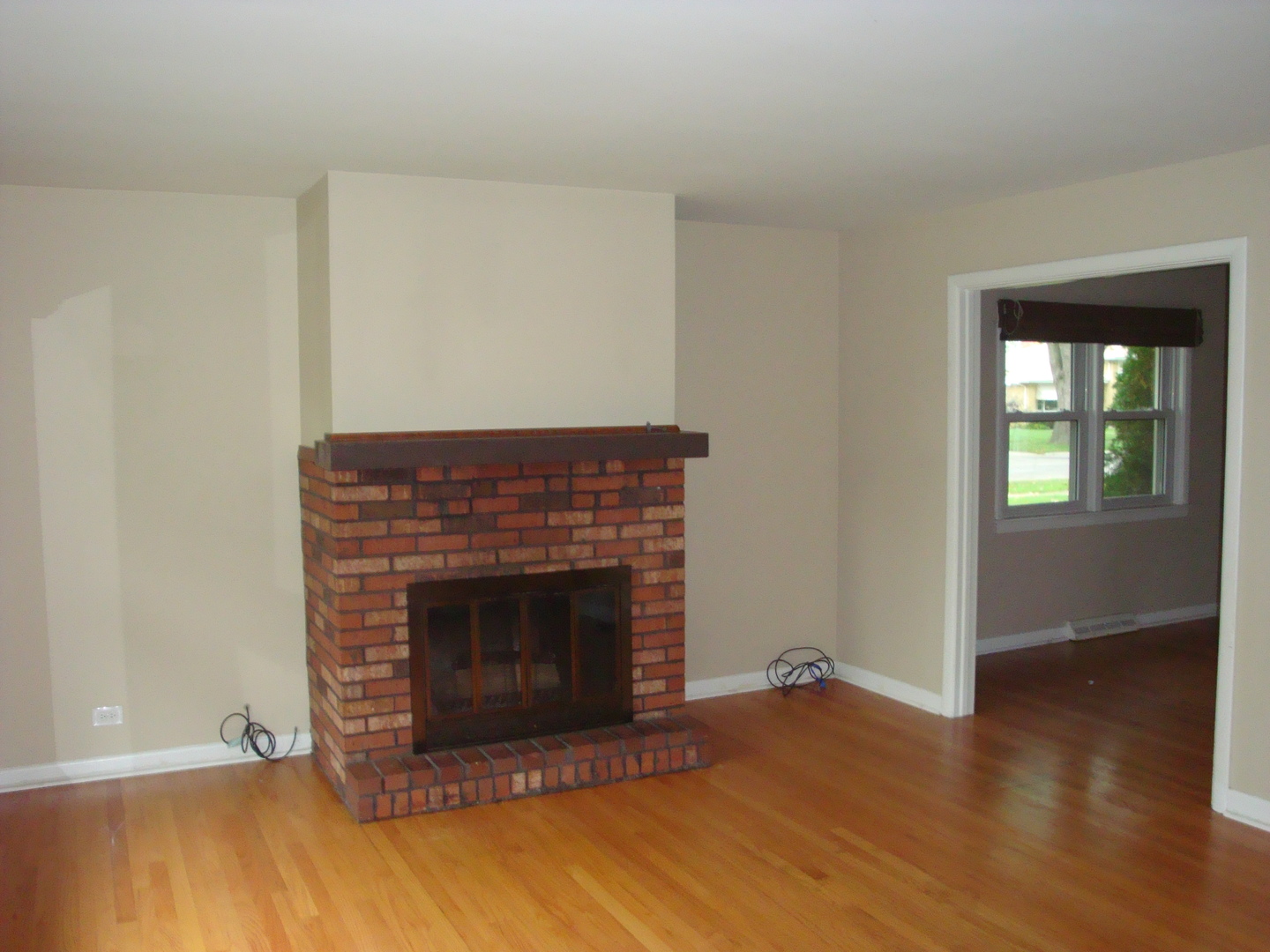 601 Forest Road La Grange Park, IL 60526 - Photo 5 of 22 a living room with a fireplace
