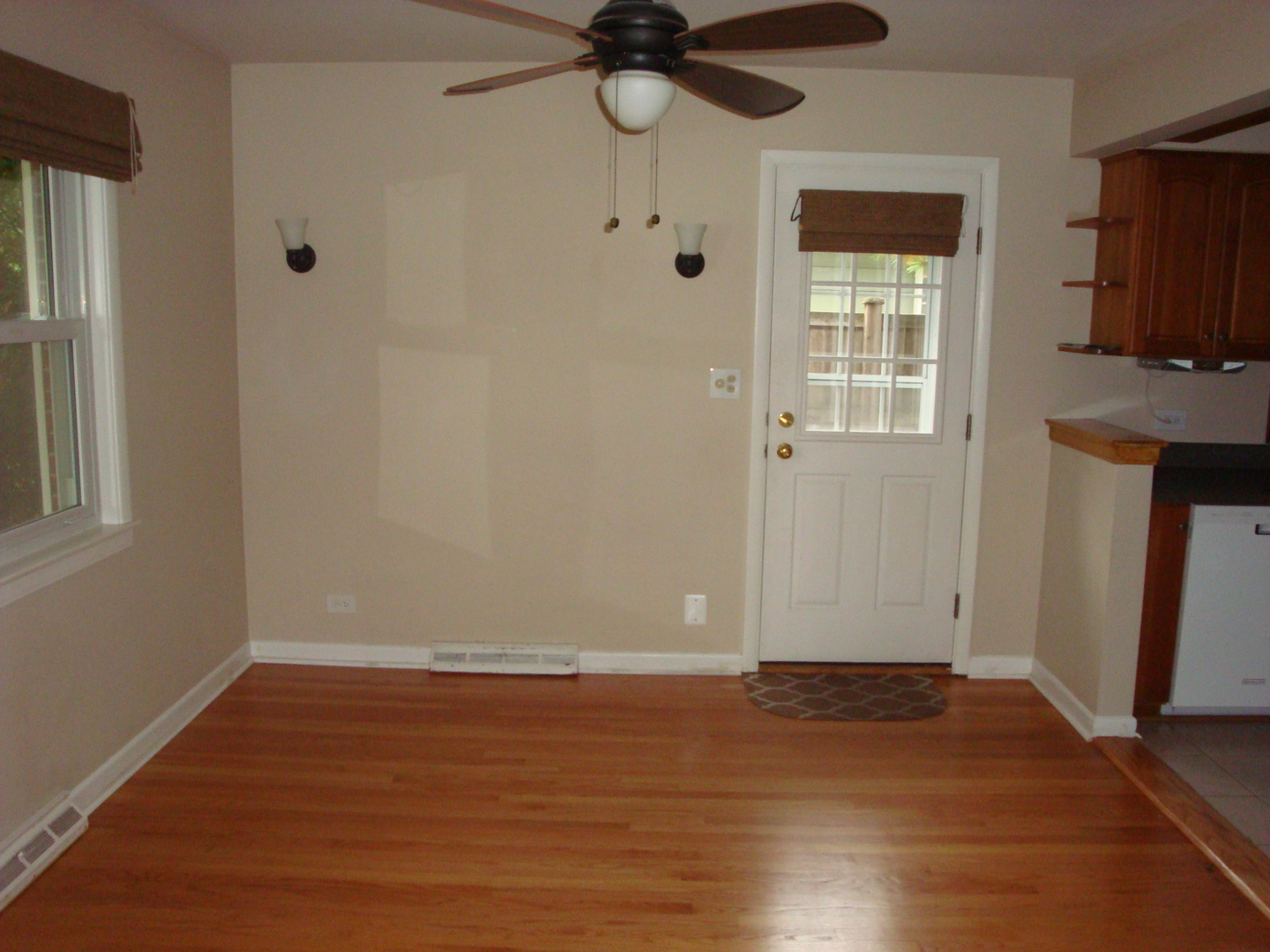 601 Forest Road La Grange Park, IL 60526 - Photo 8 of 22 a view of empty room with wooden floor and fan