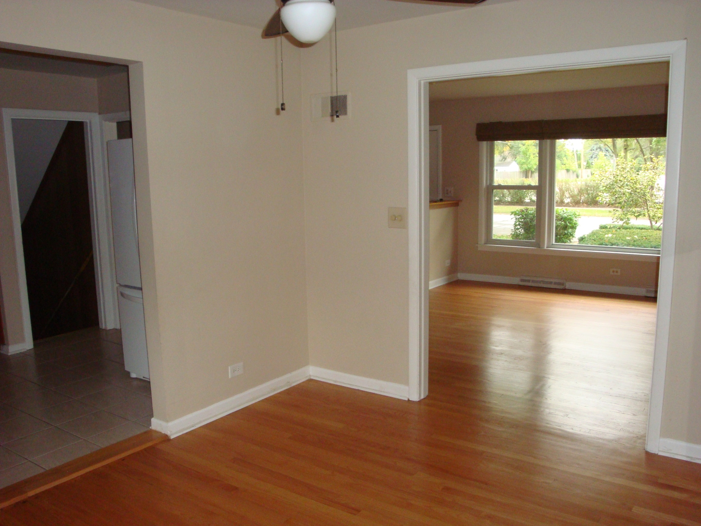601 Forest Road La Grange Park, IL 60526 - Photo 9 of 22 a view of empty room with wooden floor and fan
