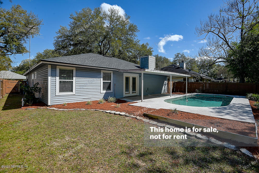 12794 Moose Road Jacksonville, FL 32226 - Photo 7 of 26 a front view of a house with a yard