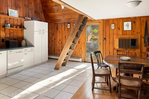 a living room with furniture and a floor