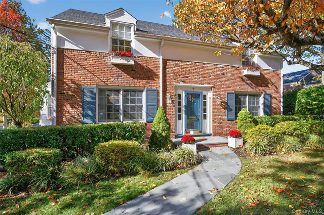 front view of a house with a yard