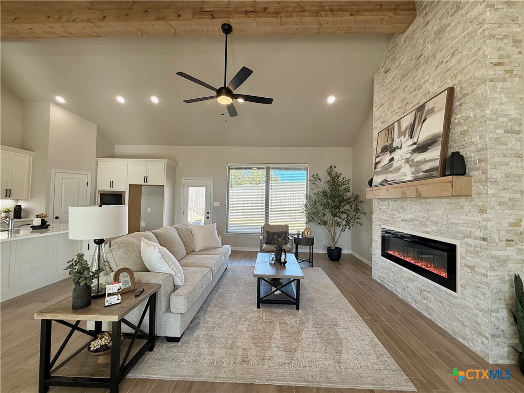 203 Lasso Loop Lorena, TX 76655 - Photo 7 of 37 a living room with furniture and a fireplace