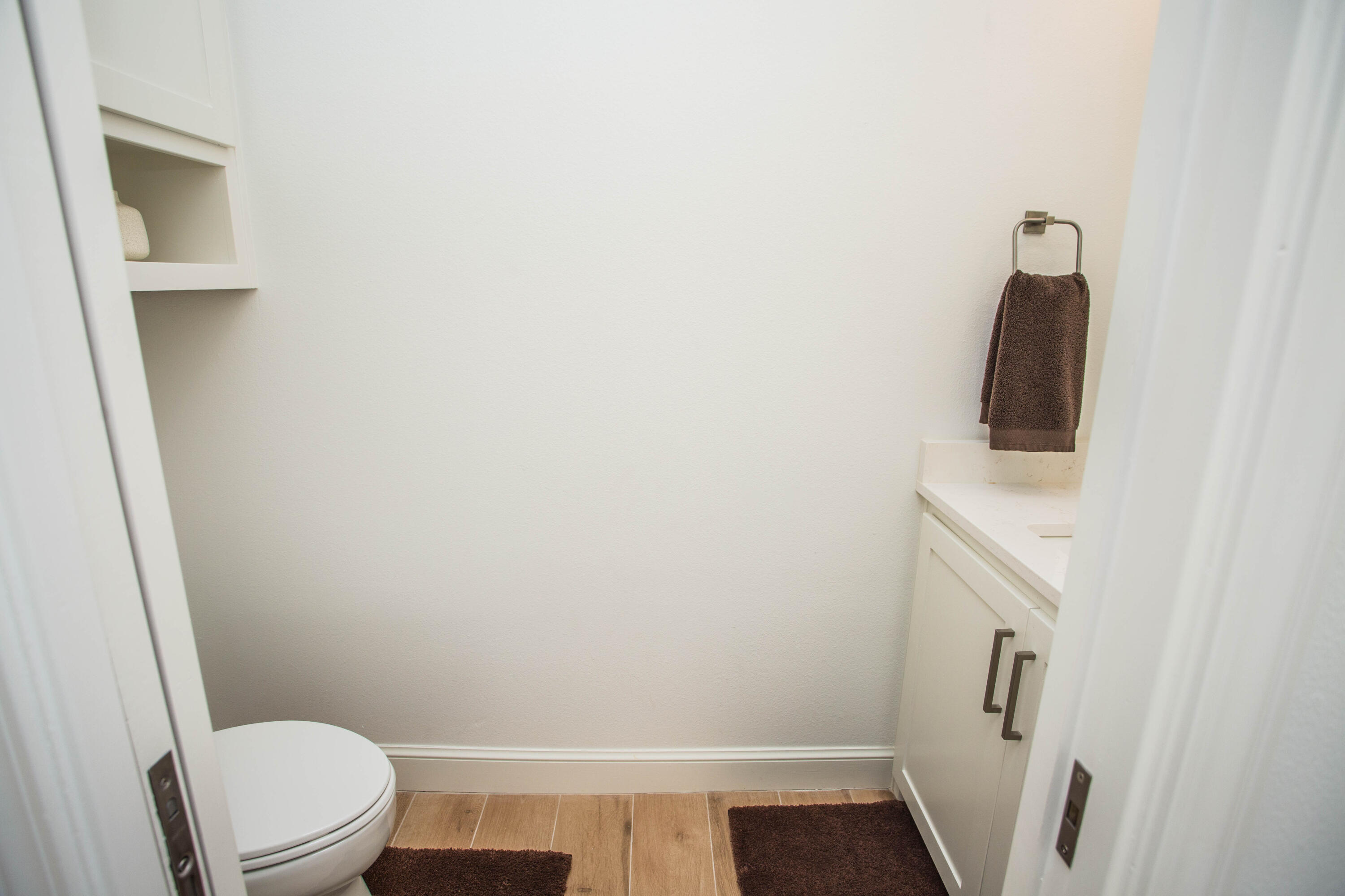 209 South Holliday Plainview, TX 79072 - Photo 20 of 29 a bathroom with a toilet and a sink