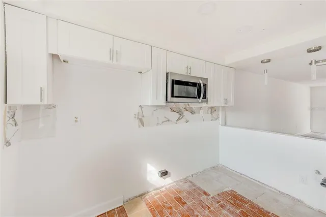 a bathroom with a bathtub and a sink