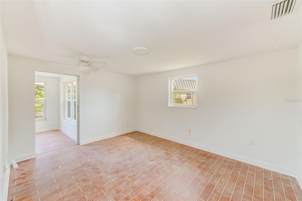 4308 Summersun Drive New Port Richey, FL 34652 - Photo 18 of 42 an empty room with windows and closet