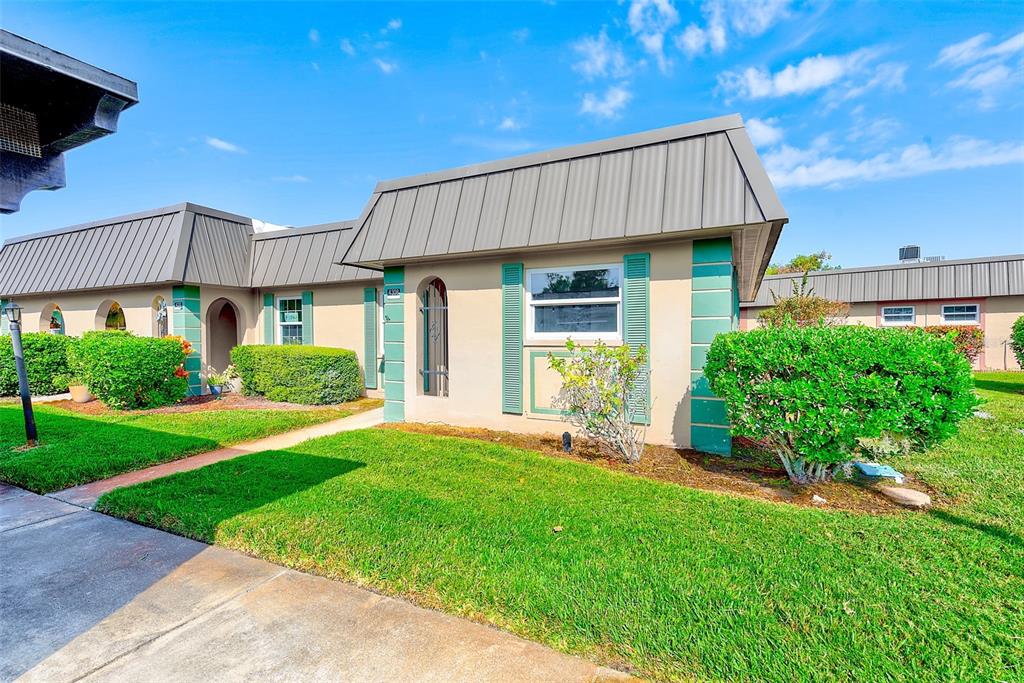 4308 Summersun Drive New Port Richey, FL 34652 - Photo 2 of 42 a view of a house with a yard