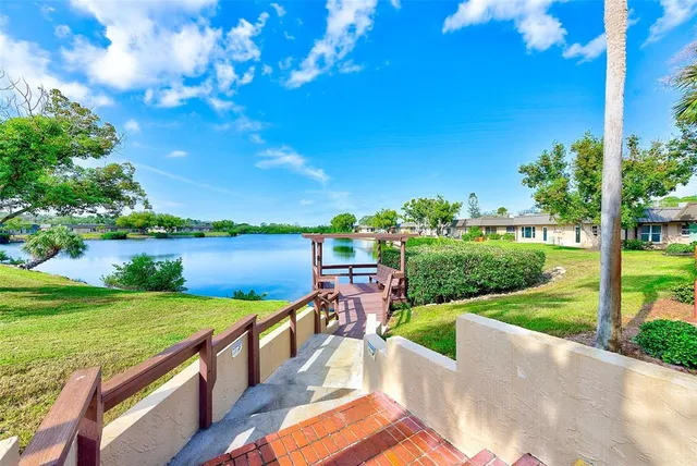 a view of a garden with lake view