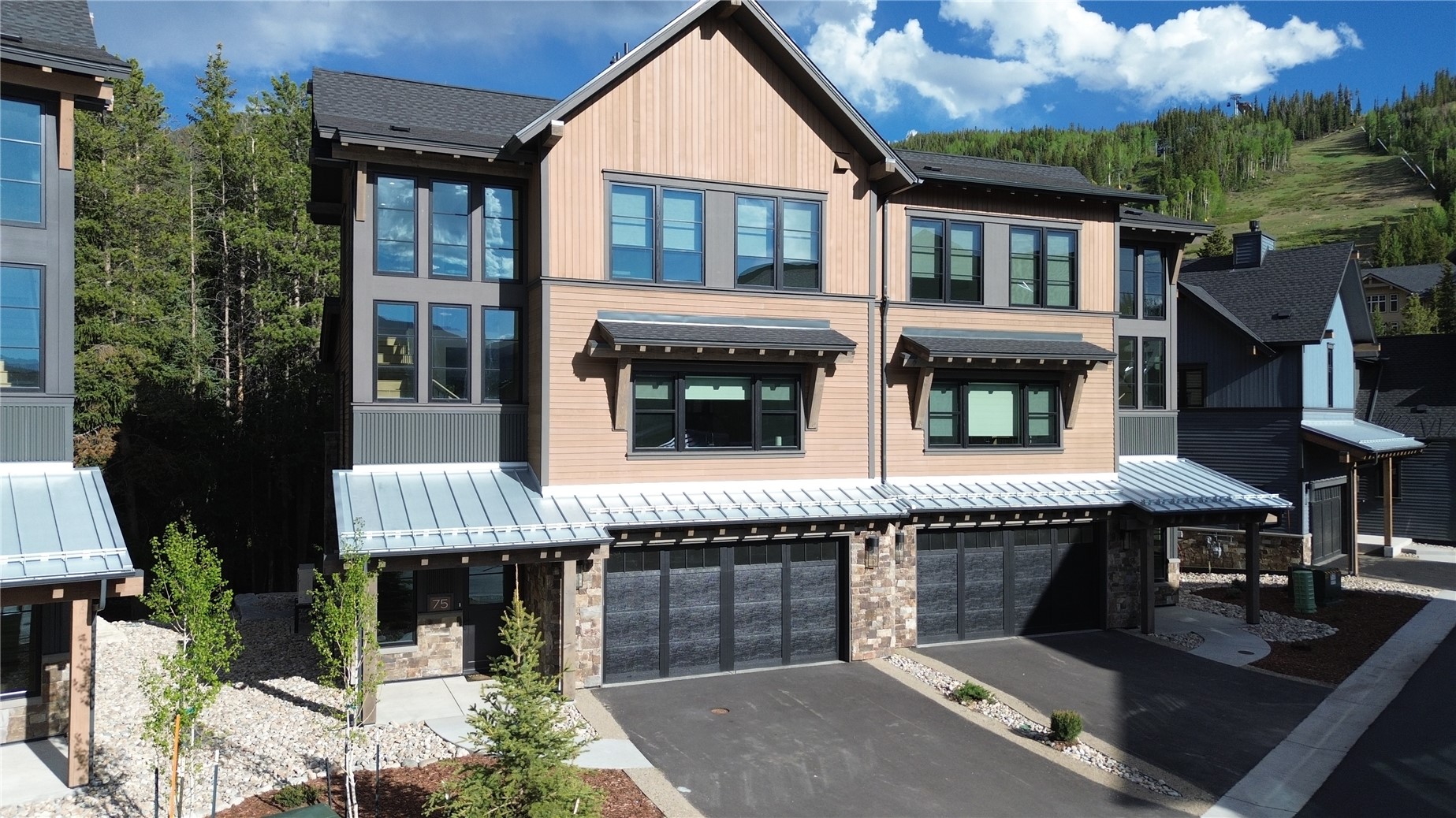 75 Alcove Court, Unit 75 Keystone, CO 80435 - Photo 1 of 40 a front view of a house with balcony and outdoor seating