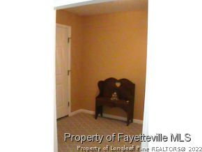 82 Ridgecrest Road Cameron, NC 28326 - Photo 3 of 12 a bathroom with a sink and a mirror