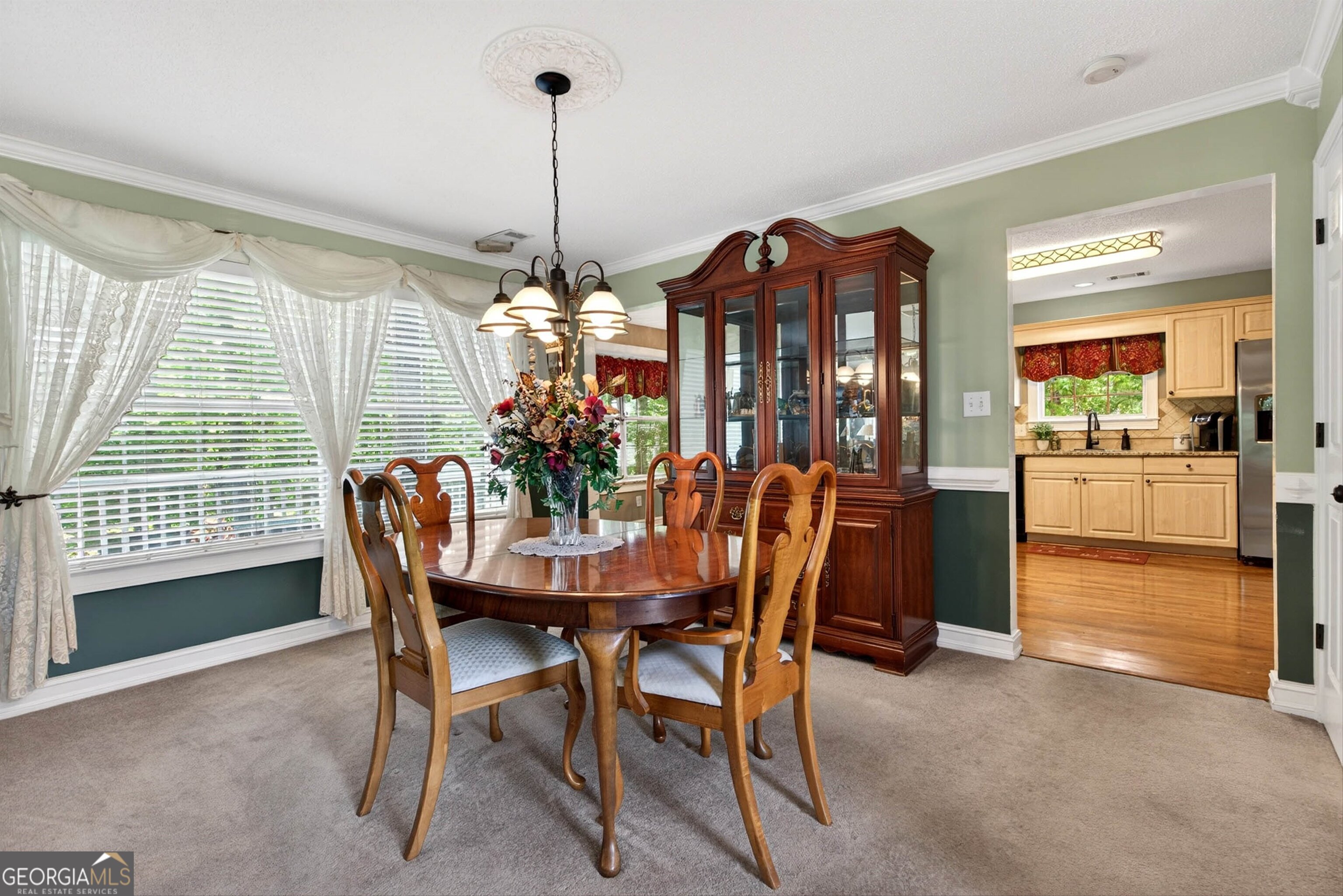 101 Emerald Lane Hampton, GA 30228 - Photo 15 of 72 a dining room with furniture and window