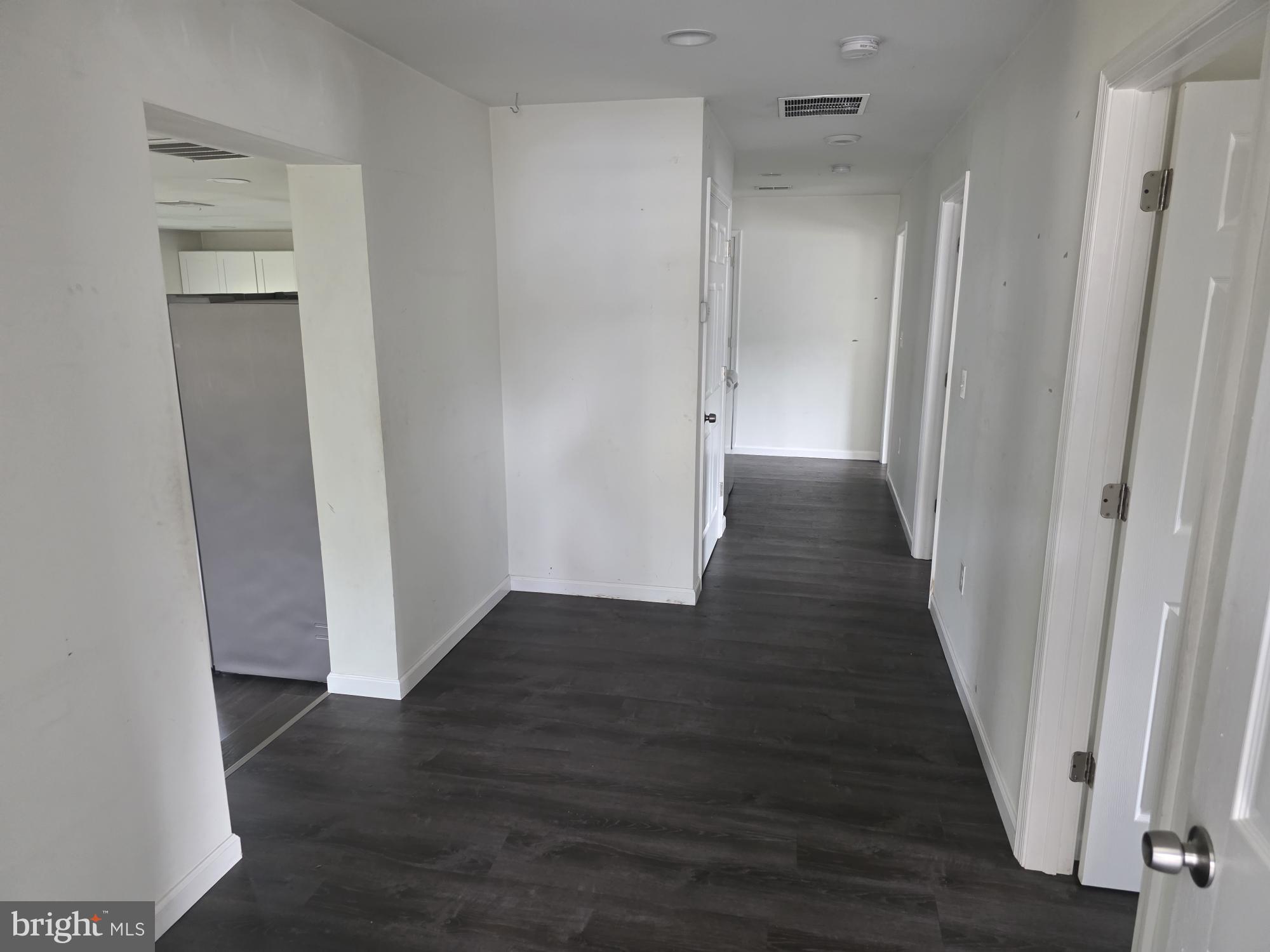 203 East Cedarville Road Pottstown, PA 19465 - Photo 4 of 17 a view of a hallway with wooden floor