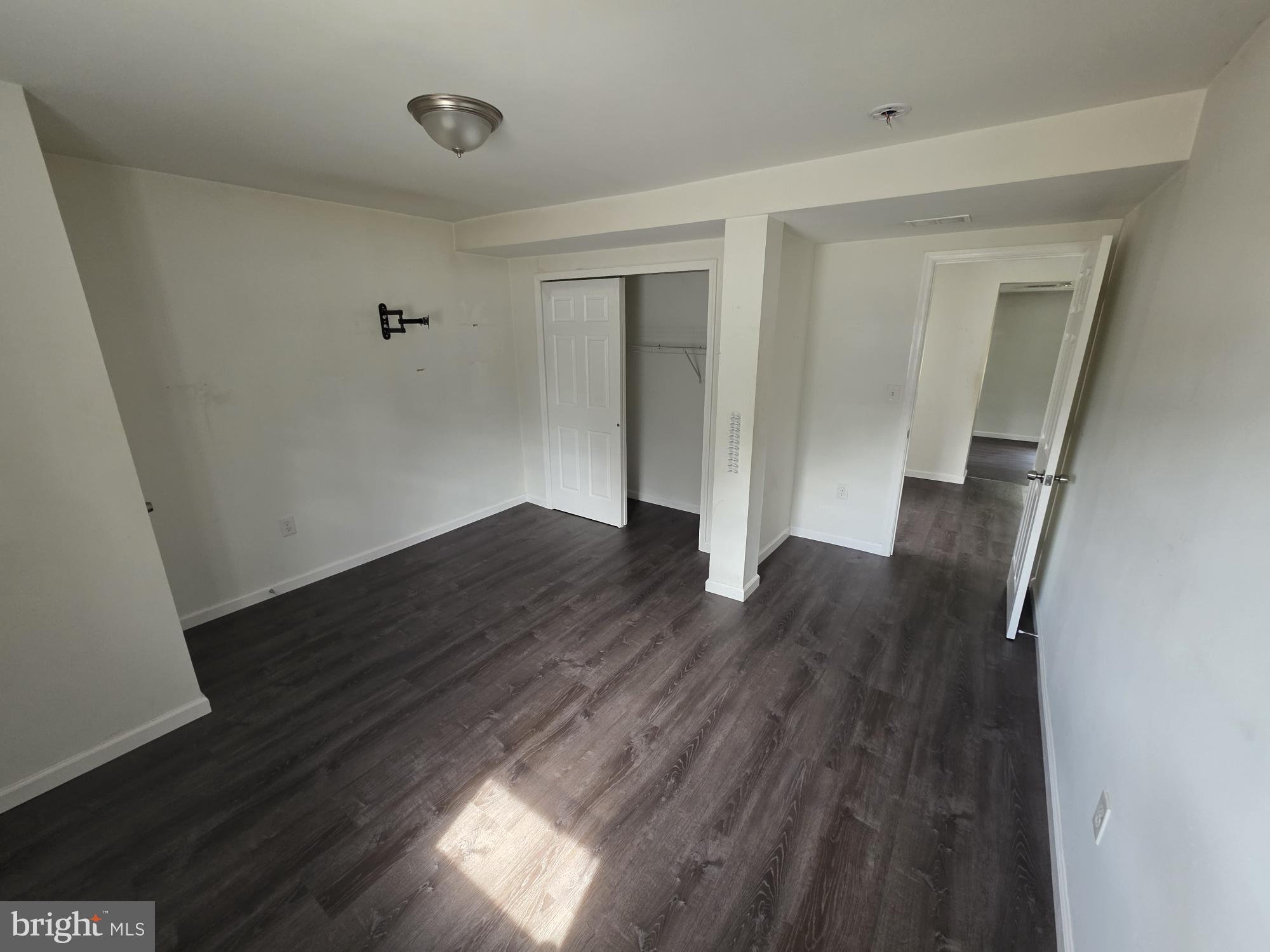 203 East Cedarville Road Pottstown, PA 19465 - Photo 5 of 17 wooden floor in an empty room with a window