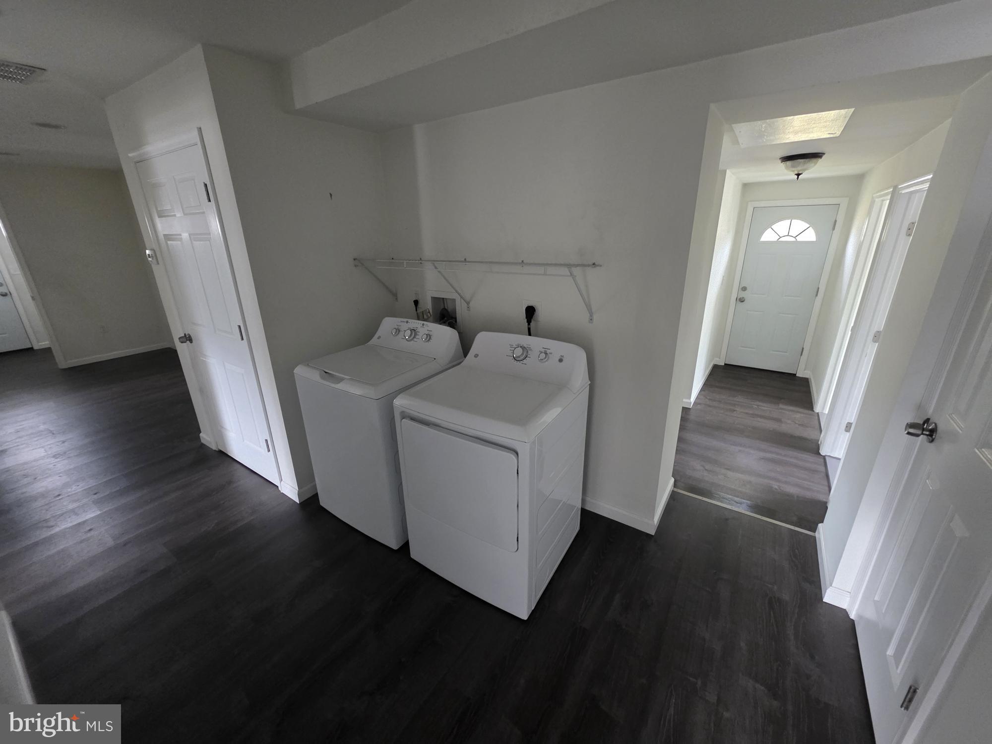 203 East Cedarville Road Pottstown, PA 19465 - Photo 8 of 17 a view of a hallway with washer and dryer
