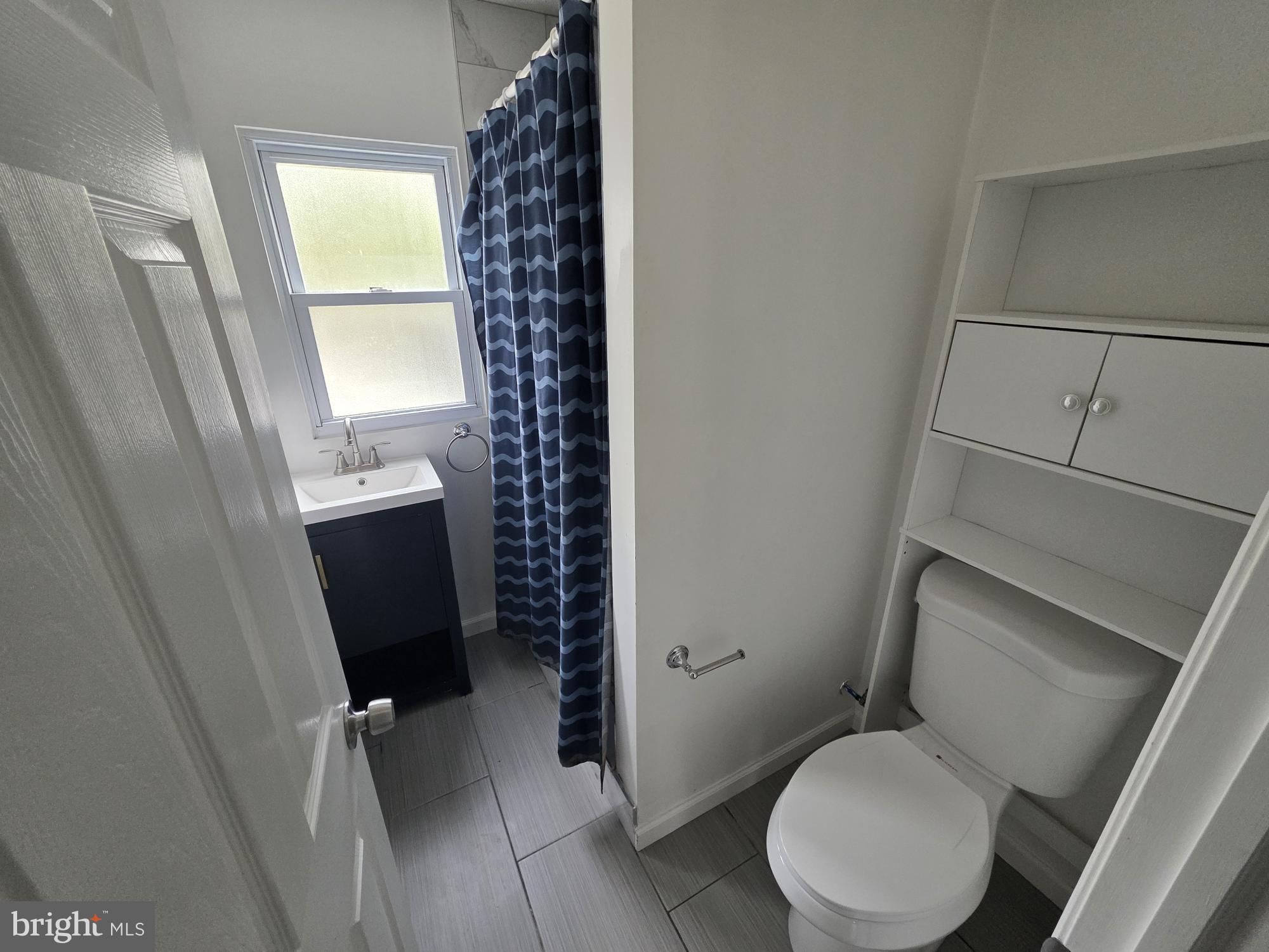 203 East Cedarville Road Pottstown, PA 19465 - Photo 9 of 17 a bathroom with a toilet and a sink