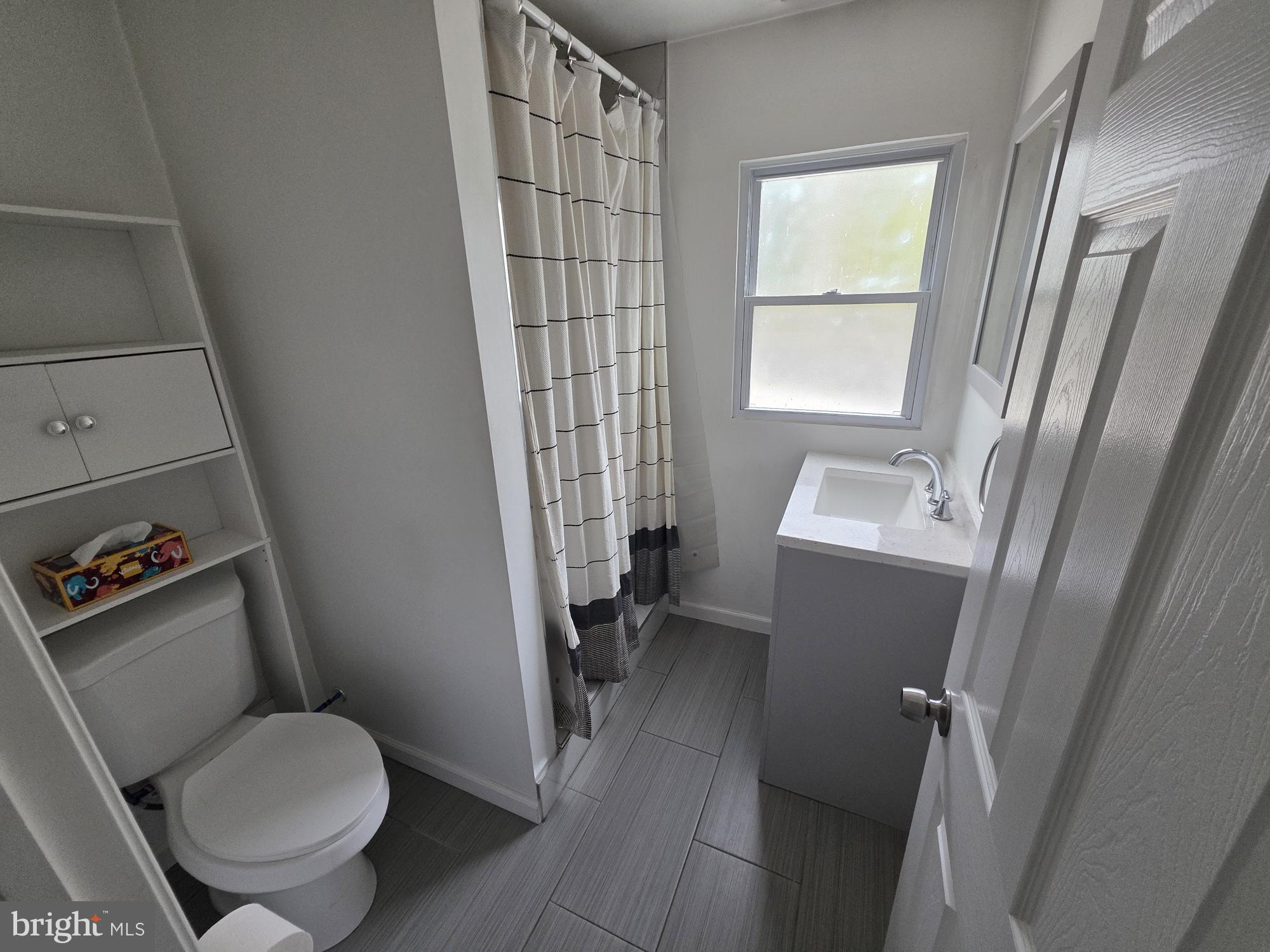 203 East Cedarville Road Pottstown, PA 19465 - Photo 10 of 17 a bathroom with a toilet and a shower