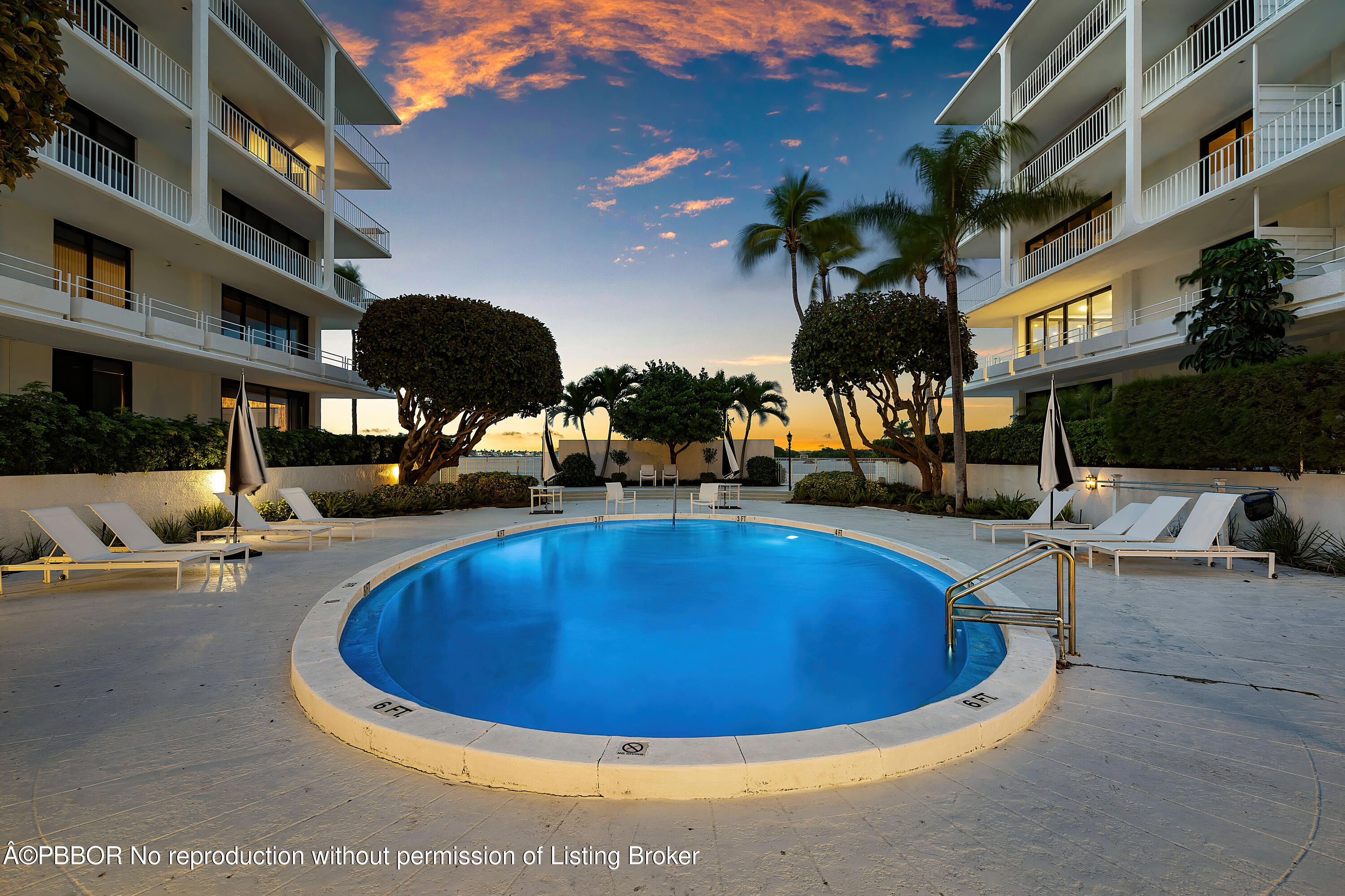 2150 Ibis Isle Road, Unit 80 Palm Beach, FL 33480 - Photo 22 of 29 Towers Pool at Dusk