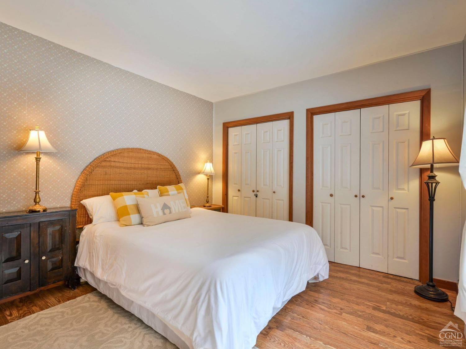 110 Maplecrest Road Windham, NY 12439 - Photo 20 of 73 a bedroom with a bed and a lamp