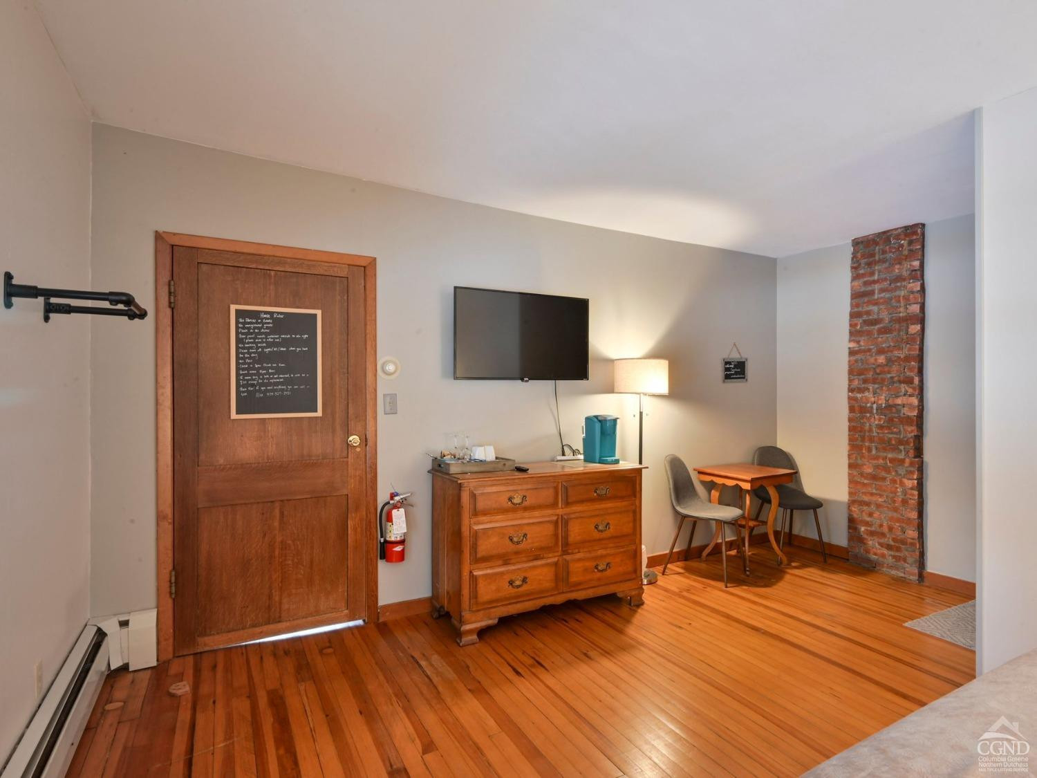 110 Maplecrest Road Windham, NY 12439 - Photo 30 of 73 a room with furniture and a flat screen tv