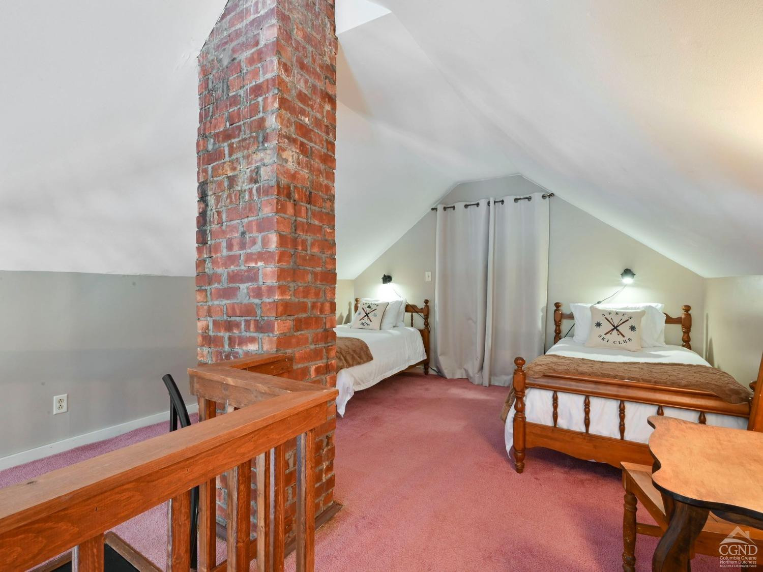 110 Maplecrest Road Windham, NY 12439 - Photo 49 of 73 a bedroom with furniture and a window