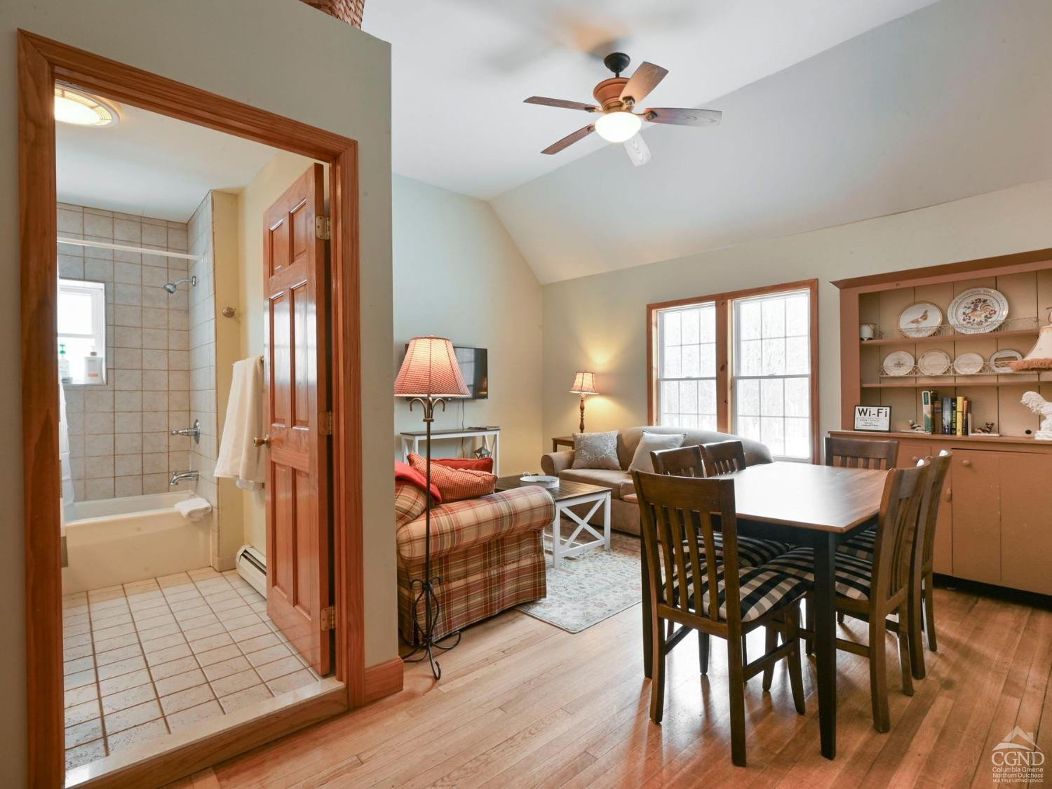 110 Maplecrest Road Windham, NY 12439 - Photo 53 of 73 a view of a a dining room with furniture window and wooden floor