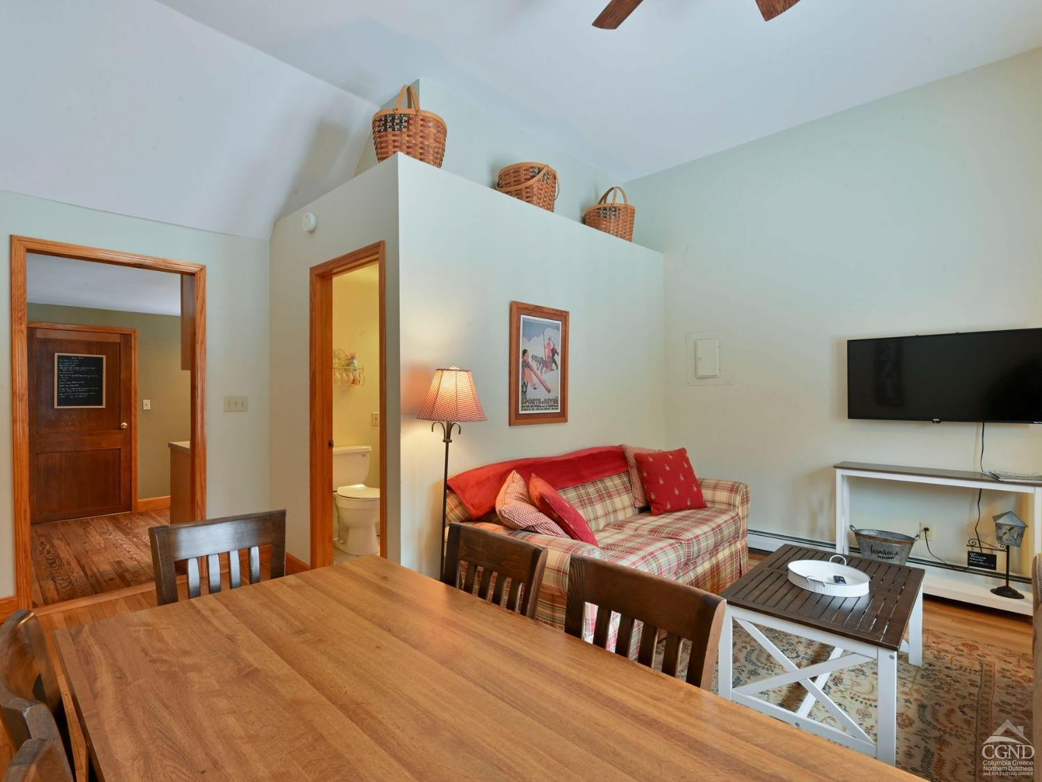 110 Maplecrest Road Windham, NY 12439 - Photo 56 of 73 a bedroom with furniture and a flat screen tv