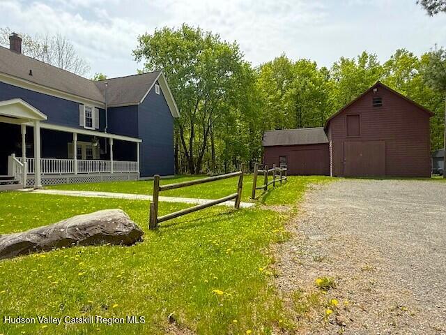 110 Maplecrest Road Windham, NY 12439 - Photo 64 of 73 a view of a house with a yard and a large tree