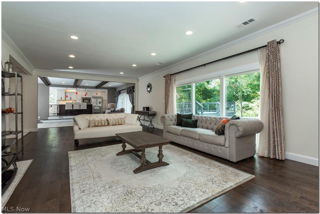 3200 Lander Road Pepper Pike, OH 44124 - Photo 13 of 35 Huge family room with a gorgeous stone fireplace with sliders to the patio