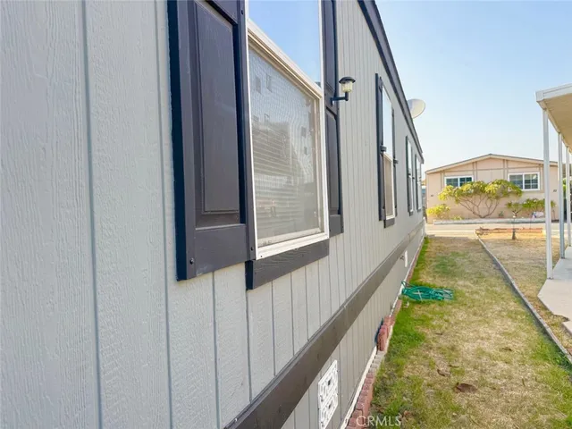 a balcony with view of car parked